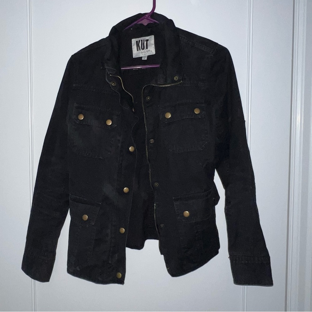 Black jacket with gold accents